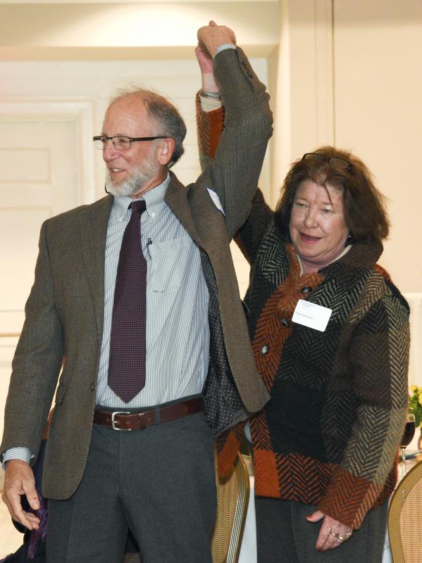 Trish Vernon, co-publisher/editor, right, and Dennis Forney, publisher emeritus, are asked to stand and make themselves known to the crowd.